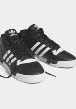 Adidas Originals RIVALRY MID UNISEX - Sneakersy Wysokie - Core Black/ftwr White/core Black -Sklep Toni Pons 01b6af678c33428bb5fdf8b2cbc61393